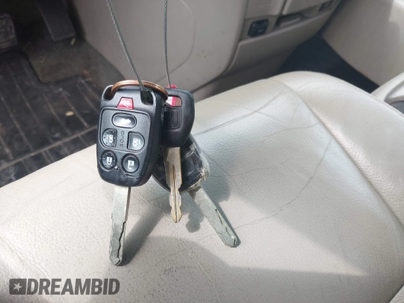 2011 Honda Odyssey EX-L with VIN 5FNRL5H6XBB096891, listed as a IAAI auction lot 42840531 with 214,842 mi miles and . Bid and sale history available at DreamBid. Image 11.