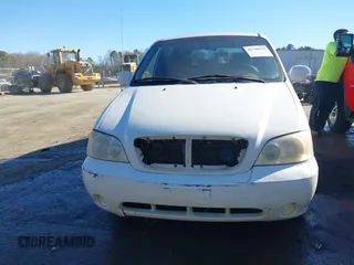 2005 Kia Sedona LX with VIN KNDUP132956703200, listed as a IAAI auction lot 41700159 with 125,578 mi miles. Bid and sale history available at carsss.com. Image 12.