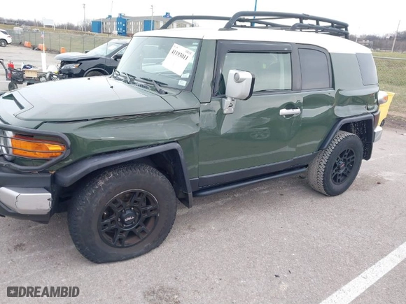 2010 Toyota FJ Cruiser with VIN JTEBU4BF6AK080671, listed as a IAAI auction lot 41193011 with 97,192 mi miles. Bid and sale history available at carsss.com. Image 6.