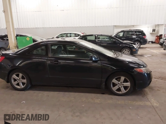2006 Honda Civic Cpe LX with VIN 2HGFG12606H006660, listed as a IAAI auction lot 41813548 with 122,398 mi miles. Bid and sale history available at carsss.com. Image 13.