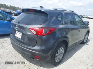 2015 Mazda CX-5 Touring with VIN JM3KE2CY2F0530204, listed as a IAAI auction lot 41788921 with 50,827 mi miles. Bid and sale history available at carsss.com. Image 4.