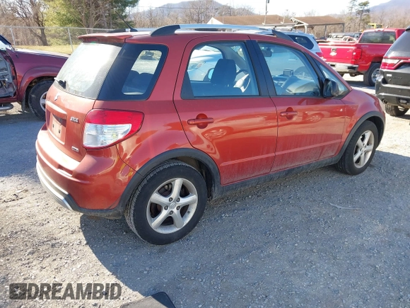 2009 Suzuki SX4 Touring AWD z VIN JS2YB417595100925, wystawiony jako IAAI lot #41693882 z przebiegiem 76 972 mil mil oraz . Historia ofert i sprzedaży dostępna na DreamBid. Obrazek 4.