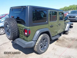 2023 Jeep Wrangler Sport S with VIN 1C4HJXDN0PW695795, listed as a IAAI auction lot 41974691 with 32,734 mi miles and . Bid and sale history available at DreamBid. Image 4.
