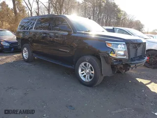 2018 Chevrolet Suburban LT with VIN 1GNSKHKC9JR231718, listed as a IAAI auction lot 41633505 with 180,734 mi miles. Bid and sale history available at carsss.com. Image 1.