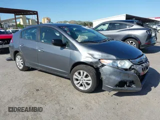 2013 Honda Insight EX z VIN JHMZE2H75DS006066, wystawiony jako IAAI lot #42078111 z przebiegiem 216 766 mil mil oraz . Historia ofert i sprzedaży dostępna na DreamBid. Obrazek 1.