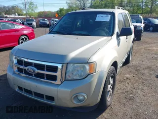 2010 Ford Escape XLT with VIN 1FMCU9D75AKB64794, listed as a IAAI auction lot 42141609 with 118,791 mi miles. Bid and sale history available at carsss.com. Image 6.