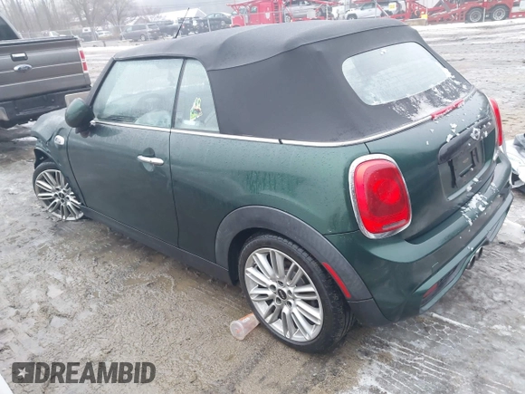 2017 MINI Convertible Cooper S z VIN WMWWG9C38H3C81071, wystawiony jako IAAI lot #41522738 z przebiegiem 59 040 mil mil oraz . Historia ofert i sprzedaży dostępna na DreamBid. Obrazek 3.