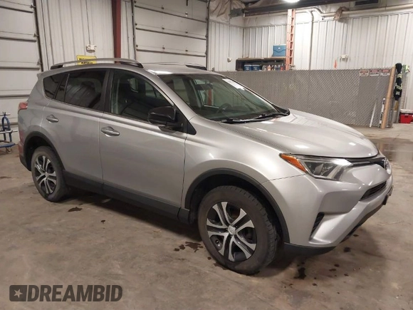 2016 Toyota RAV4 LE with VIN 2T3BFREV8GW509257, listed as a IAAI auction lot 41807349 with 216,031 mi miles. Bid and sale history available at carsss.com. Image 1.