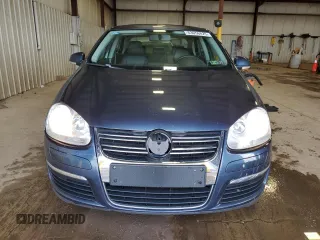 2009 Volkswagen Jetta SE z VIN 3VWRZ71KX9M167334, wystawiony jako Copart lot #63056825 z przebiegiem 187 466 mil mil oraz Szkoda całkowita • Salvage title. Historia ofert i sprzedaży dostępna na DreamBid. Obrazek 5.