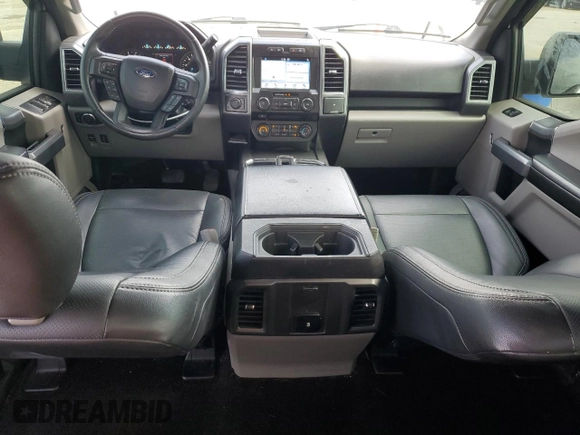 2018 Ford F-150 XL with VIN 1FTEW1E59JFA28036, listed as a Copart auction lot 57181525 with 121,384 mi miles and Salvage title. Bid and sale history available at DreamBid. Image 8.