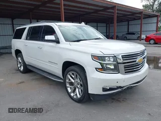 2016 Chevrolet Suburban LTZ with VIN 1GNSKJKCXGR166782, listed as a IAAI auction lot 41562200 with 121,232 mi miles. Bid and sale history available at carsss.com. Image 1.