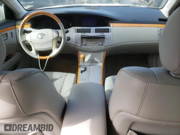 2007 Toyota Avalon XL z VIN 4T1BK36B67U251181, wystawiony jako Copart lot #58021485 z przebiegiem 166 367 mil mil oraz Szkoda całkowita • Salvage title. Historia ofert i sprzedaży dostępna na DreamBid. Obrazek 8.