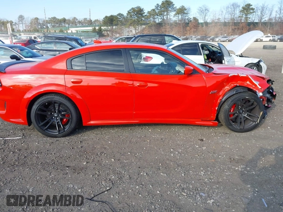 2022 Dodge Charger Scat Pack Widebody with VIN 2C3CDXGJ3NH101081, listed as a IAAI auction lot 41351466 with 9,575 mi miles and . Bid and sale history available at DreamBid. Image 13.