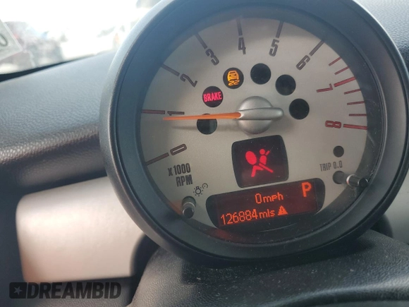 2012 MINI Hardtop with VIN WMWSU3C53CT542313, listed as a Copart auction lot 55098295 with 126,884 mi miles and Salvage Title. Bid and sale history available at DreamBid. Image 9.