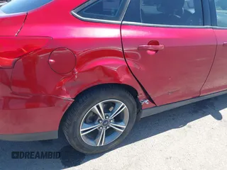 2017 Ford Focus SE with VIN 1FADP3FE3HL206074, listed as a IAAI auction lot 42594911 with 143,814 mi miles and . Bid and sale history available at DreamBid. Image 6.