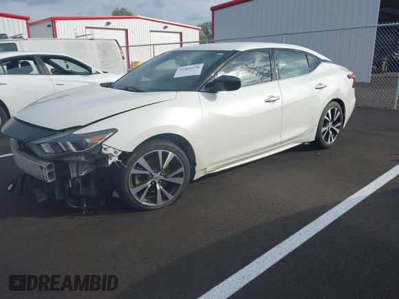 2017 Nissan Maxima SV z VIN 1N4AA6AP8HC365378, wystawiony jako IAAI lot #41984258 z przebiegiem 159 267 mil mil oraz . Historia ofert i sprzedaży dostępna na DreamBid. Obrazek 2.