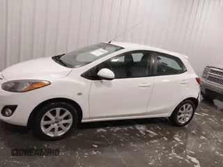 2014 Mazda 2 Touring z VIN JM1DE1LY6E0171403, wystawiony jako IAAI lot #41416489 z przebiegiem 84 494 mil mil oraz . Historia ofert i sprzedaży dostępna na DreamBid. Obrazek 14.