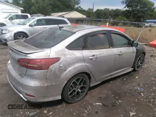2015 Ford Focus SE with VIN 1FADP3F2XFL345234, listed as a IAAI auction lot 42402207 with Not provided miles and . Bid and sale history available at DreamBid. Image 4.