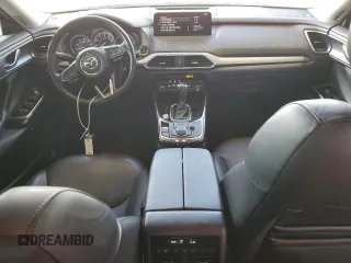 2022 Mazda CX-9 Touring Plus with VIN JM3TCBAYXN0607056, listed as a Copart auction lot 61740065 with 59,281 mi miles and Salvage title. Bid and sale history available at DreamBid. Image 8.
