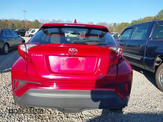 2020 Toyota C-HR LE with VIN JTNKHMBXXL1090061, listed as a IAAI auction lot 41124269 with 99,034 mi miles. Bid and sale history available at carsss.com. Image 17.