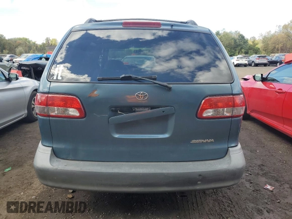 2002 Toyota Sienna LE with VIN 4T3ZF13CX2U463618, listed as a Copart auction lot 73660534 with 279,315 mi miles and Salvage Title. Bid and sale history available at carsss.com. Image 6.