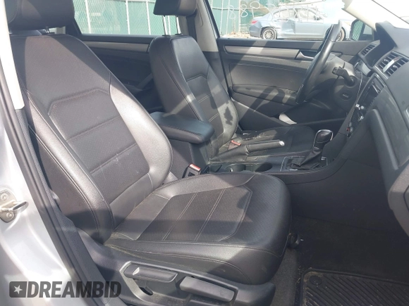 2015 Volkswagen Passat S with VIN 1VWAS7A33FC112747, listed as a IAAI auction lot 41808988 with 170,381 mi miles and . Bid and sale history available at DreamBid. Image 5.
