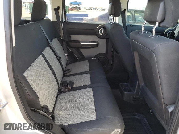 2010 Dodge Nitro SXT with VIN 1D4PU5GK1AW129356, listed as a Copart auction lot 53111155 with 158,818 mi miles and Salvage Title. Bid and sale history available at DreamBid. Image 11.