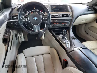 2014 BMW 6 Series 640i z VIN WBA6A0C5XED317733, wystawiony jako Copart lot #51289785 z przebiegiem 120 455 mil mil oraz Szkoda całkowita • Salvage title. Historia ofert i sprzedaży dostępna na DreamBid. Obrazek 8.