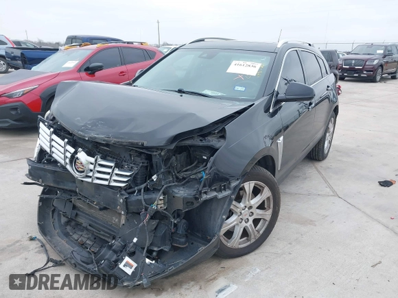2015 Cadillac SRX Premium Collection z VIN 3GYFNDE3XFS576695, wystawiony jako IAAI lot #41612836 z przebiegiem Nie podano mil oraz . Historia ofert i sprzedaży dostępna na DreamBid. Obrazek 6.