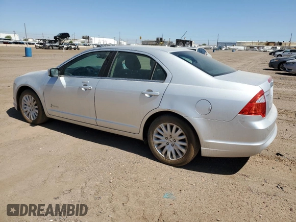 2011 Ford Fusion Hybrid с VIN 3FADP0L36BR251407, выставлен на аукционе Copart как лот 57838085 с пробегом 129 972 миль миль и Чистый • Clean title. История ставок и продаж доступна на DreamBid. Изображение 2.