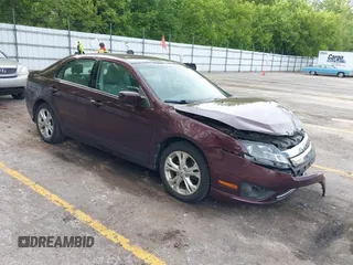 2012 Ford Fusion SE z VIN 3FAHP0HA4CR432631, wystawiony jako IAAI lot #42352368 z przebiegiem 137 053 mil mil oraz . Historia ofert i sprzedaży dostępna na DreamBid. Obrazek 1.