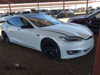 2016 Tesla Model S 90D with VIN 5YJSA1E22GF149639, listed as a IAAI auction lot 42583167 with Not provided miles and . Bid and sale history available at DreamBid. Image 1.