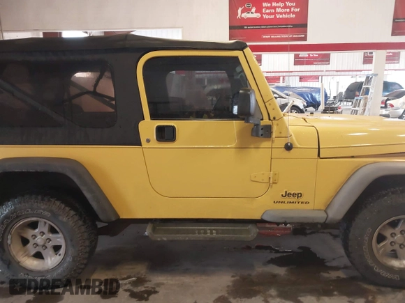 2005 Jeep Wrangler Unlimited with VIN 1J4FA44S95P373346, listed as a IAAI auction lot 41707821 with 175,865 mi miles. Bid and sale history available at carsss.com. Image 13.
