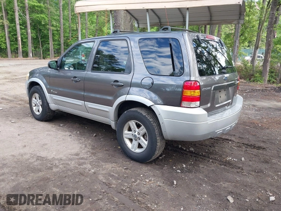 2005 Ford Escape Hybrid with VIN 1FMCU95H45KD91052, listed as a IAAI auction lot 42200393 with 304,817 mi miles and . Bid and sale history available at DreamBid. Image 3.