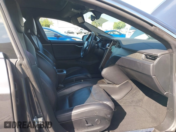 2018 Tesla Model S 75D with VIN 5YJSA1E26JF249573, listed as a IAAI auction lot 42748801 with 88,467 mi miles and . Bid and sale history available at DreamBid. Image 5.