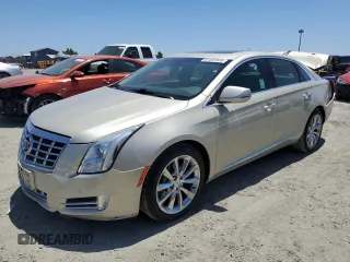 2014 Cadillac XTS Luxury with VIN 2G61N5S36E9154545, listed as a Copart auction lot 61497945 with 138,166 mi miles and Salvage title. Bid and sale history available at DreamBid. Image 1.
