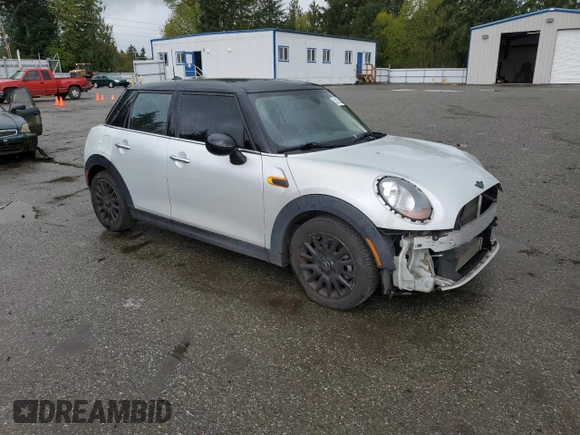 2016 MINI Hardtop 4 Door z VIN WMWXU1C51G2D12553, wystawiony jako Copart lot #52935265 z przebiegiem 57 593 mil mil oraz Szkoda całkowita • Salvage title. Historia ofert i sprzedaży dostępna na DreamBid. Obrazek 4.