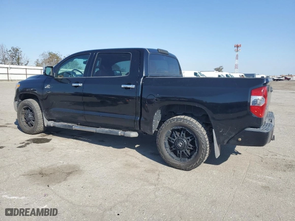 2014 Toyota Tundra 4WD Truck Platinum with VIN 5TFAY5F12EX404586, listed as a Copart auction lot 50430165 with 160,045 mi miles and Salvage Title. Bid and sale history available at carsss.com. Image 2.