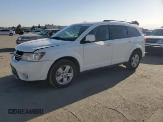 2012 Dodge Journey SXT z VIN 3C4PDDBG3CT350007, wystawiony jako Copart lot #60426105 z przebiegiem 139 131 mil mil oraz Czysty tytuł • Clean title. Historia ofert i sprzedaży dostępna na DreamBid. Obrazek 1.