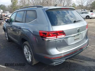 2021 Volkswagen Atlas SE z VIN 1V2WR2CA0MC585259, wystawiony jako IAAI lot #41525783 z przebiegiem 80 101 mil mil oraz . Historia ofert i sprzedaży dostępna na DreamBid. Obrazek 3.