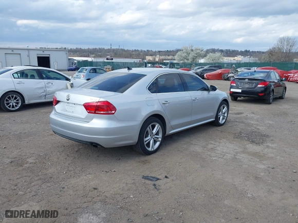 2012 Volkswagen Passat SE w/Sunroof with VIN 1VWBM7A32CC100678, listed as a IAAI auction lot 41925484 with 154,373 mi miles. Bid and sale history available at carsss.com. Image 4.