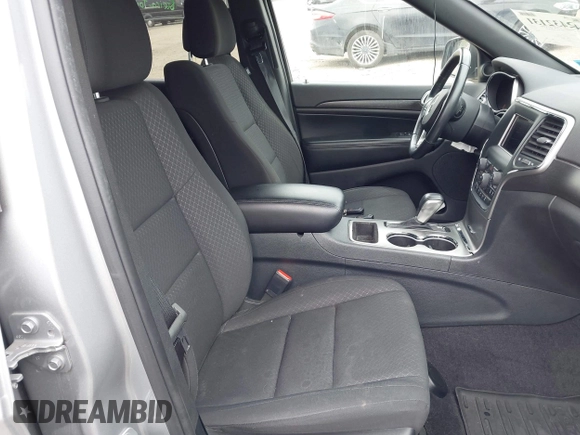2018 Jeep Grand Cherokee Laredo E with VIN 1C4RJFAG5JC377197, listed as a IAAI auction lot 42432131 with 58,981 mi miles and . Bid and sale history available at DreamBid. Image 5.
