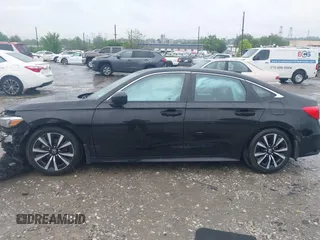 2022 Honda Civic EX z VIN 2HGFE1F70NH320722, wystawiony jako IAAI lot #42264449 z przebiegiem Nie podano mil oraz . Historia ofert i sprzedaży dostępna na DreamBid. Obrazek 13.