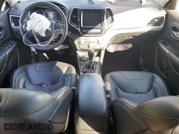 2019 Jeep Cherokee High Altitude with VIN 1C4PJMDX4KD133124, listed as a Copart auction lot 55817625 with 76,621 mi miles and Salvage title. Bid and sale history available at DreamBid. Image 8.
