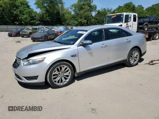 2014 Ford Taurus Limited z VIN 1FAHP2F80EG134695, wystawiony jako Copart lot #65724945 z przebiegiem 82 189 mil mil oraz Szkoda całkowita • Salvage title. Historia ofert i sprzedaży dostępna na DreamBid. Obrazek 1.