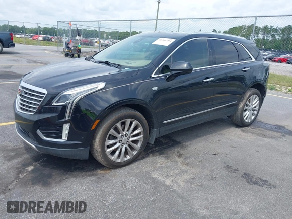 2017 Cadillac XT5 Platinum AWD z VIN 1GYKNFRS9HZ125677, wystawiony jako IAAI lot #42366784 z przebiegiem 152 116 mil mil oraz . Historia ofert i sprzedaży dostępna na DreamBid. Obrazek 18.