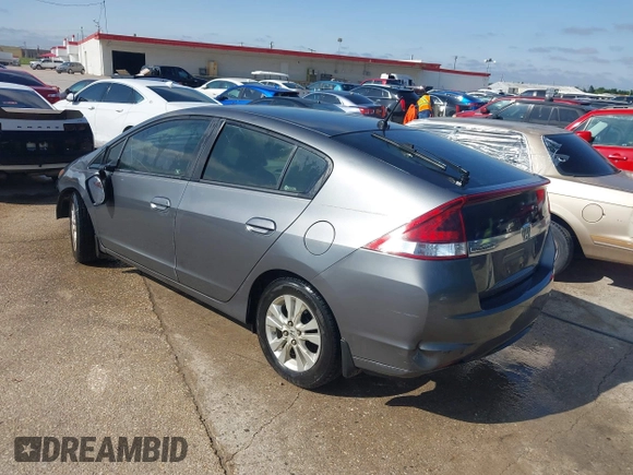 2013 Honda Insight EX with VIN JHMZE2H74DS002123, listed as a IAAI auction lot 42204860 with 279,376 mi miles and . Bid and sale history available at DreamBid. Image 3.