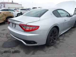 2013 Maserati GranTurismo Sport with VIN ZAM45VLA1D0072153, listed as a IAAI auction lot 41443836 with 44,991 mi miles. Bid and sale history available at carsss.com. Image 4.