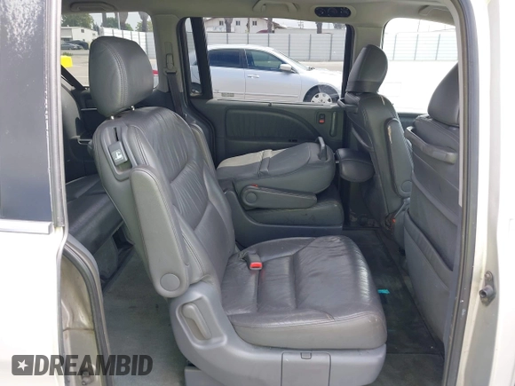 2005 Honda Odyssey EX-L with VIN 5FNRL38745B075486, listed as a IAAI auction lot 42080772 with 197,158 mi miles and . Bid and sale history available at DreamBid. Image 8.