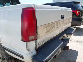 1997 Chevrolet C/K 1500 with VIN 1GCEC19R0VE225713, listed as a IAAI auction lot 41990404 with 408,387 mi miles. Bid and sale history available at carsss.com. Image 14.